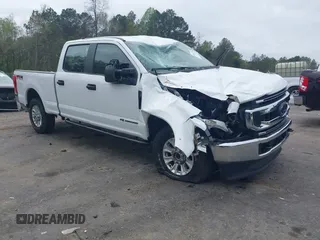2022 Ford F-250 XL z VIN 1FT7W2BT3NEC98831, wystawiony jako IAAI lot #41851281 z przebiegiem 24 876 mil mil oraz . Historia ofert i sprzedaży dostępna na DreamBid. Obrazek 1.