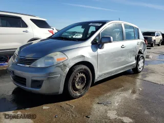 2009 Nissan Versa 1.8 S with VIN 3N1BC13E59L456317, listed as a Copart auction lot 88060125 with 76,337 mi miles and Salvage Title. Bid and sale history available at carsss.com. Image 1.