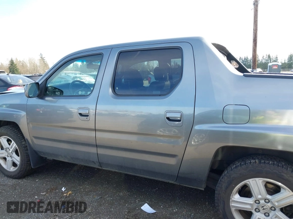 2009 Honda Ridgeline RTL with VIN 5FPYK16599B100707, listed as a IAAI auction lot 41877598 with 130,622 mi miles and . Bid and sale history available at DreamBid. Image 14.