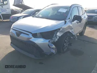 2023 Toyota Corolla Cross Hybrid S with VIN 7MUFBABG8PV011345, listed as a IAAI auction lot 41286619 with 13,518 mi miles and . Bid and sale history available at DreamBid. Image 6.