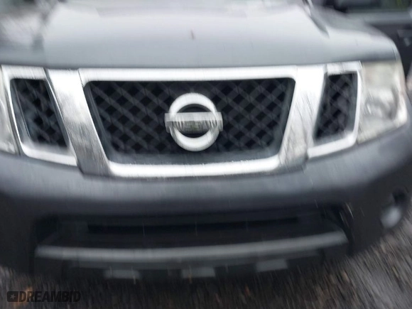 2012 Nissan Pathfinder SV with VIN 5N1AR1NBXCC611355, listed as a IAAI auction lot 41517590 with 128,870 mi miles. Bid and sale history available at carsss.com. Image 6.