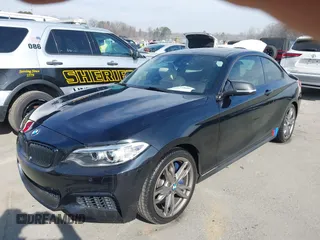 2015 BMW 2 Series M235i with VIN WBA1J7C55FV358964, listed as a IAAI auction lot 41674800 with 63,504 mi miles and . Bid and sale history available at carsss.com. Image 17.
