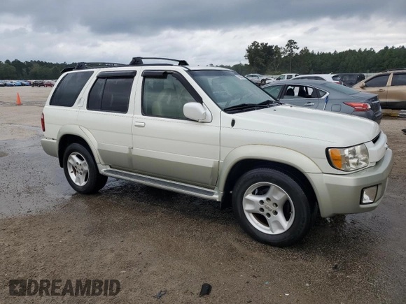 2003 Infiniti QX4 with VIN JNRDR09X83W251941, listed as a Copart auction lot 71044774 with 162,214 mi miles and Salvage Title. Bid and sale history available at DreamBid. Image 4.