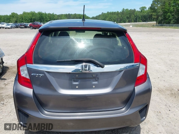 2016 Honda Fit EX z VIN JHMGK5H73GX031816, wystawiony jako IAAI lot #42295931 z przebiegiem Nie podano mil oraz . Historia ofert i sprzedaży dostępna na DreamBid. Obrazek 17.