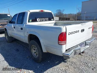 2001 Dodge Dakota Sport with VIN 1B7HG2AN21S290140, listed as a IAAI auction lot 41702251 with 350,678 mi miles. Bid and sale history available at carsss.com. Image 3.