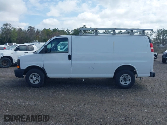2013 Chevrolet Express Cargo with VIN 1GCWGFBA7D1110560, listed as a IAAI auction lot 41730234 with 185,291 mi miles and . Bid and sale history available at DreamBid. Image 14.