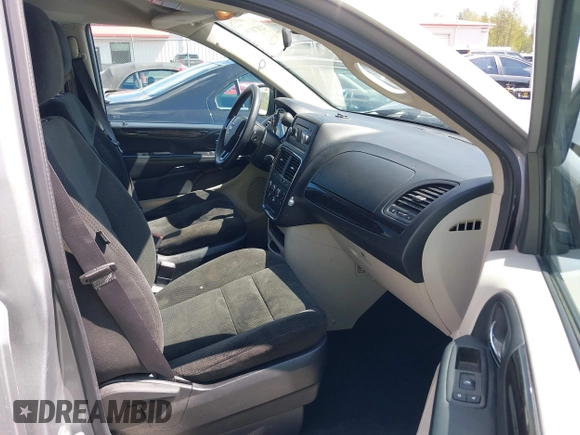 2016 Dodge Grand Caravan SE with VIN 2C4RDGBGXGR220549, listed as a IAAI auction lot 42074110 with 114,826 mi miles and . Bid and sale history available at DreamBid. Image 5.