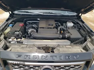 2024 Nissan Frontier Pro-X with VIN 1N6ED1EJ5RN669959, listed as a Copart auction lot 58217315 with 3,828 mi miles and Salvage title. Bid and sale history available at DreamBid. Image 14.