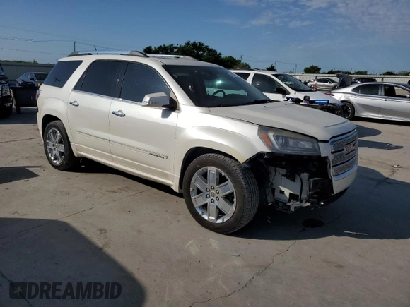 2014 GMC Acadia Denali z VIN 1GKKVTKD2EJ358735, wystawiony jako Copart lot #52299545 z przebiegiem 192 817 mil mil oraz Czysty tytuł • Clean title. Historia ofert i sprzedaży dostępna na DreamBid. Obrazek 4.