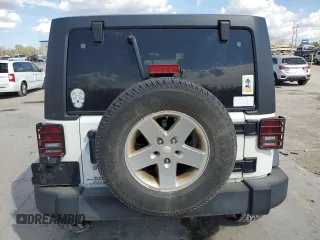 2013 Jeep Wrangler Unlimited Sport z VIN 1C4BJWDG0DL690966, wystawiony jako Copart lot #50554615 z przebiegiem 101 383 mil mil oraz Szkoda całkowita • Salvage title. Historia ofert i sprzedaży dostępna na DreamBid. Obrazek 6.
