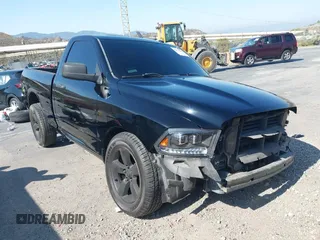 2014 Ram 1500 Express with VIN 3C6JR6AT5EG305140, listed as a IAAI auction lot 42444478 with 140,072 mi miles and . Bid and sale history available at DreamBid. Image 1.