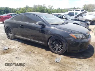 2009 Scion tC with VIN JTKDE167390302286, listed as a Copart auction lot 54697385 with 155,519 mi miles and Salvage Title. Bid and sale history available at carsss.com. Image 4.