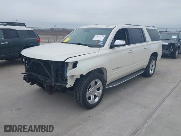 2015 Chevrolet Suburban LTZ with VIN 1GNSCKKC7FR641421, listed as a IAAI auction lot 41637137 with 139,001 mi miles and . Bid and sale history available at DreamBid. Image 2.