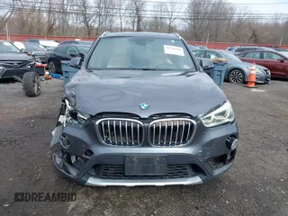 2017 BMW X1 xDrive28i with VIN WBXHT3Z39H4A57753, listed as a IAAI auction lot 41726790 with 52,509 mi miles. Bid and sale history available at carsss.com. Image 12.