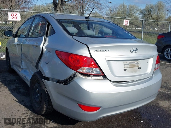 2013 Hyundai Accent GLS with VIN KMHCT4AE4DU477465, listed as a IAAI auction lot 41930256 with 48,877 mi miles and . Bid and sale history available at carsss.com. Image 3.