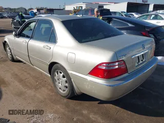 2004 Acura RL w/Navigation System with VIN JH4KA96674C007830, listed as a IAAI auction lot 41146234 with 80,611 mi miles. Bid and sale history available at carsss.com. Image 3.