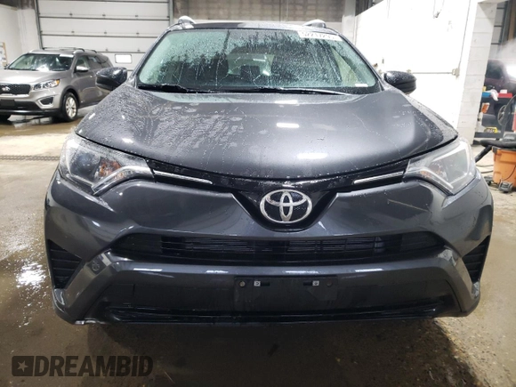 2016 Toyota RAV4 LE with VIN JTMBFREV3GD195188, listed as a Copart auction lot 52217295 with 113,808 mi miles and Salvage Title. Bid and sale history available at DreamBid. Image 5.