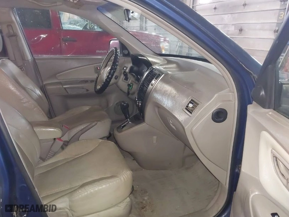 2005 Hyundai Tucson GLS with VIN KM8JN72DX5U076853, listed as a IAAI auction lot 41669853 with 164,241 mi miles. Bid and sale history available at carsss.com. Image 5.