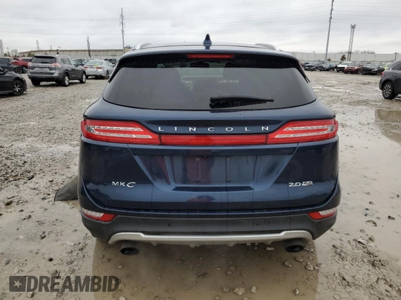 2016 Lincoln MKC Premier with VIN 5LMCJ1D94GUJ23580, listed as a Copart auction lot 80867134 with 120,792 mi miles and Salvage Title. Bid and sale history available at DreamBid. Image 6.