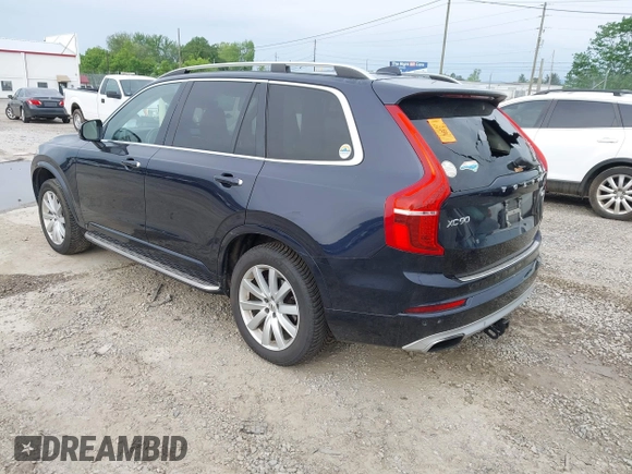 2016 Volvo XC90 T6 Momentum with VIN YV4A22PK7G1058660, listed as a IAAI auction lot 42201130 with 130,487 mi miles. Bid and sale history available at carsss.com. Image 3.