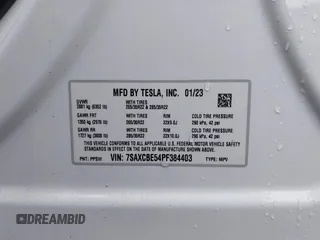 2023 Tesla Model X with VIN 7SAXCBE54PF384403, listed as a IAAI auction lot 40947187 with 16,881 mi miles and . Bid and sale history available at DreamBid. Image 9.