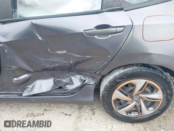 2020 Honda Civic LX z VIN 19XFC2F66LE012481, wystawiony jako IAAI lot #42297600 z przebiegiem 56 602 mil mil oraz . Historia ofert i sprzedaży dostępna na DreamBid. Obrazek 12.