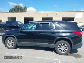 2021 Chevrolet Traverse LT Cloth with VIN 1GNERGKW9MJ162089, listed as a IAAI auction lot 41944248 with 99,586 mi miles. Bid and sale history available at carsss.com. Image 13.