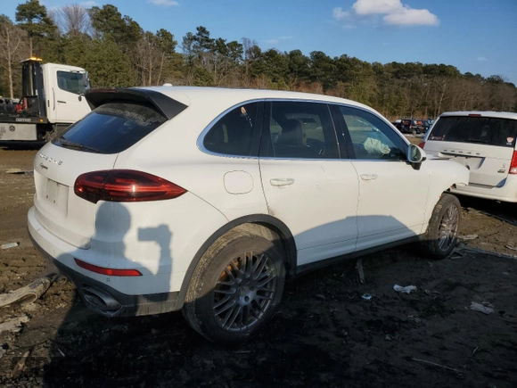 2016 Porsche Cayenne with VIN WP1AA2A29GKA13338, listed as a Copart auction lot 42319275 with 122,980 mi miles and Salvage Title. Bid and sale history available at carsss.com. Image 3.