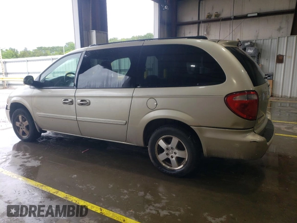 2005 Dodge Caravan SXT with VIN 2D4GP44L85R401401, listed as a Copart auction lot 58576535 with 190,858 mi miles and Salvage title. Bid and sale history available at DreamBid. Image 2.