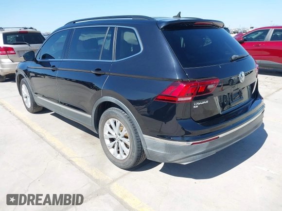 2018 Volkswagen Tiguan SEL with VIN 3VV3B7AX3JM064061, listed as a IAAI auction lot 41772564 with 95,395 mi miles and . Bid and sale history available at DreamBid. Image 3.