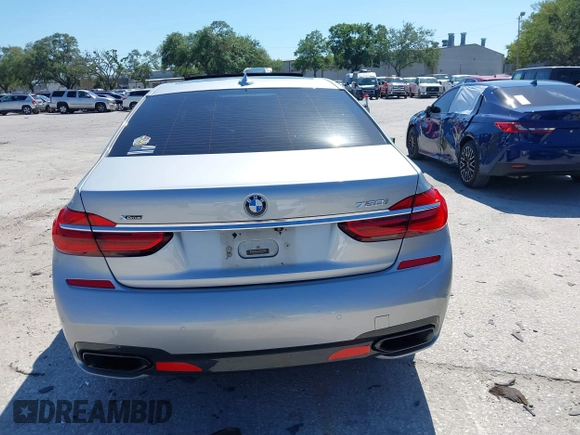 2016 BMW 7 Series 750i xDrive with VIN WBA7F2C52GG417733, listed as a IAAI auction lot 42040625 with 91,007 mi miles. Bid and sale history available at carsss.com. Image 17.