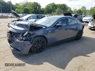 2022 Mazda 3 Carbon Edition with VIN 3MZBPACL6NM302149, listed as a Copart auction lot 62943465 with 42,670 mi miles and Salvage title. Bid and sale history available at DreamBid. Image 1.