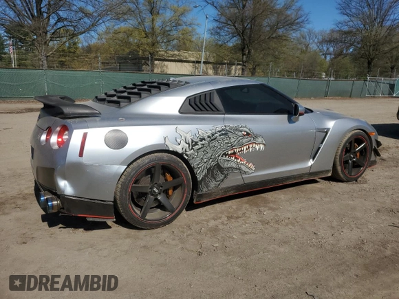 2009 Nissan GT-R Premium z VIN JN1AR54F89M252139, wystawiony jako Copart lot #52062915 z przebiegiem 73 483 mil mil oraz Szkody całkowita. Historia ofert i sprzedaży dostępna na DreamBid. Obrazek 3.
