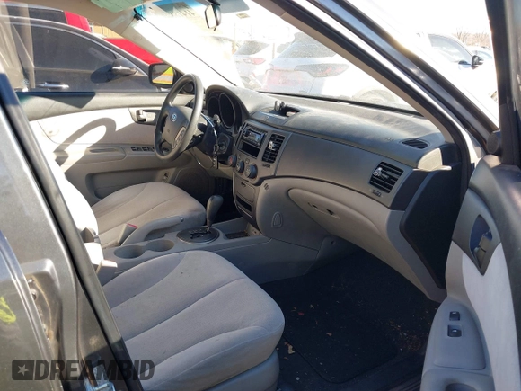 2009 Kia Optima LX with VIN KNAGE228395361458, listed as a IAAI auction lot 41418800 with 182,220 mi miles. Bid and sale history available at carsss.com. Image 5.