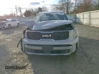 2023 Kia Telluride SX Prestige X-Pro z VIN 5XYP5DGC8PG389109, wystawiony jako Copart lot #45117445 z przebiegiem 65 110 mil mil oraz Szkoda całkowita • Salvage title. Historia ofert i sprzedaży dostępna na DreamBid. Obrazek 12.