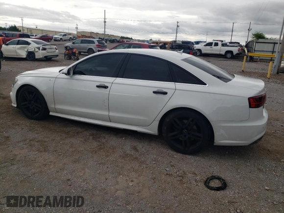 2016 Audi A6 Premium Plus with VIN WAUGFAFC1GN019459, listed as a Copart auction lot 58952325 with 127,025 mi miles and Clean title. Bid and sale history available at DreamBid. Image 2.