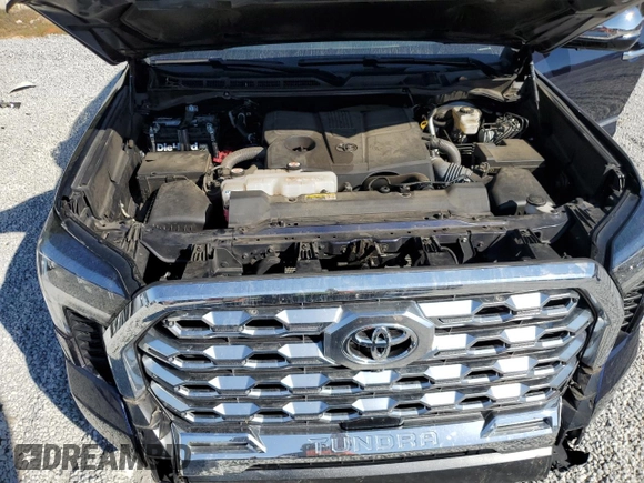 2023 Toyota Tundra 1794 Edition with VIN 5TFMA5AB9PX021944, listed as a Copart auction lot 77756214 with 76,260 mi miles and Salvage title. Bid and sale history available at DreamBid. Image 11.