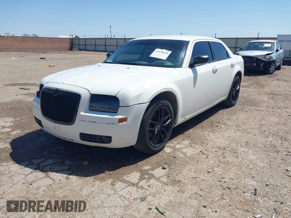 2009 Chrysler 300 Touring with VIN 2C3KA53V89H634048, listed as a IAAI auction lot 41974629 with Not Provided miles and . Bid and sale history available at DreamBid. Image 2.