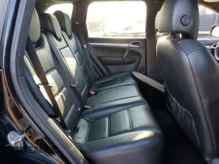 2010 Porsche Cayenne z VIN WP1AA2AP6ALA02536, wystawiony jako Copart lot #87112254 z przebiegiem 136 360 mil mil oraz Szkody całkowita. Historia ofert i sprzedaży dostępna na DreamBid. Obrazek 11.
