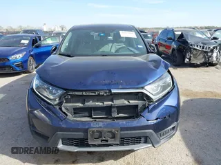 2019 Honda CR-V LX with VIN 5J6RW5H32KL003561, listed as a IAAI auction lot 41872089 with 65,146 mi miles and . Bid and sale history available at carsss.com. Image 12.