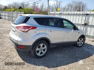 2014 Ford Escape SE with VIN 1FMCU9GX5EUC69499, listed as a Copart auction lot 51787225 with 200,898 mi miles and Salvage Title. Bid and sale history available at DreamBid. Image 3.