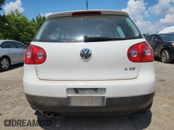 2009 Volkswagen Rabbit S with VIN WVWDB71K79W120196, listed as a Copart auction lot 62126625 with 105,695 mi miles and Salvage title. Bid and sale history available at DreamBid. Image 6.