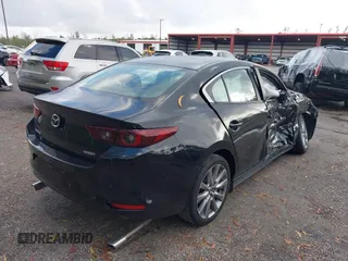 2023 Mazda 3 S Preferred with VIN 3MZBPACM6PM358989, listed as a IAAI auction lot 41120246 with 27,290 mi miles and . Bid and sale history available at DreamBid. Image 4.
