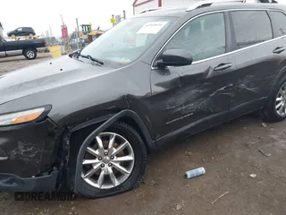 2014 Jeep Cherokee Limited with VIN 1C4PJMDS3EW137985, listed as a IAAI auction lot 41543651 with 131,312 mi miles. Bid and sale history available at carsss.com. Image 6.