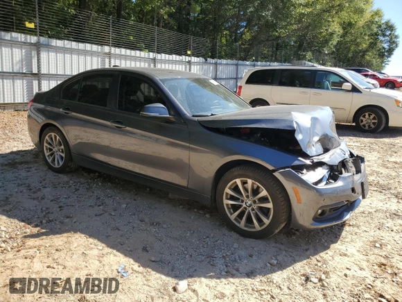 2018 BMW 3 Series 320i xDrive with VIN WBA8A3C54JA358624, listed as a Copart auction lot 74696374 with 55,342 mi miles and Salvage title. Bid and sale history available at DreamBid. Image 4.