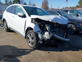 2021 Honda HR-V EX with VIN 3CZRU6H5XMM750887, listed as a IAAI auction lot 40983288 with 56,482 mi miles. Bid and sale history available at carsss.com. Image 1.