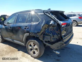 2019 Toyota RAV4 XLE with VIN JTMW1RFV5KD512086, listed as a IAAI auction lot 41695649 with 100,172 mi miles. Bid and sale history available at carsss.com. Image 6.