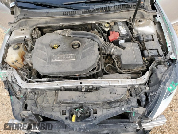 2014 Lincoln MKZ z VIN 3LN6L2G90ER815819, wystawiony jako Copart lot #61189515 z przebiegiem 101 148 mil mil oraz Szkoda całkowita • Salvage title. Historia ofert i sprzedaży dostępna na DreamBid. Obrazek 11.