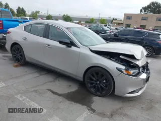 2024 Mazda 3 S Select Sport with VIN 3MZBPABM2RM422045, listed as a IAAI auction lot 42164274 with 4,926 mi miles and . Bid and sale history available at DreamBid. Image 1.