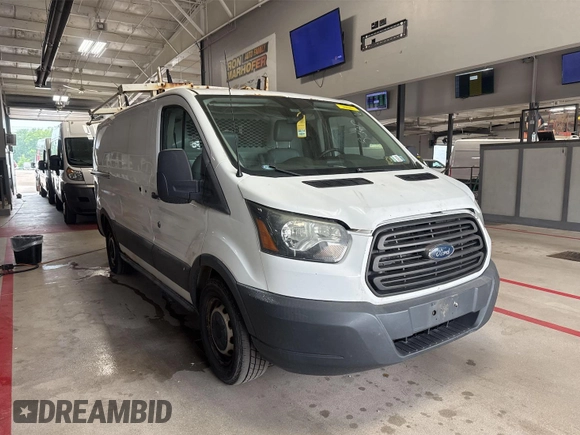 2015 Ford Transit Cargo with VIN 1FTNE1YM3FKA97437, listed as a IAAI auction lot 42786905 with 258,546 mi miles and . Bid and sale history available at DreamBid. Image 17.